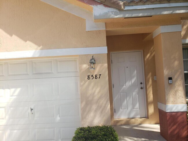 Building Photo - 8587 SW 23rd Ct