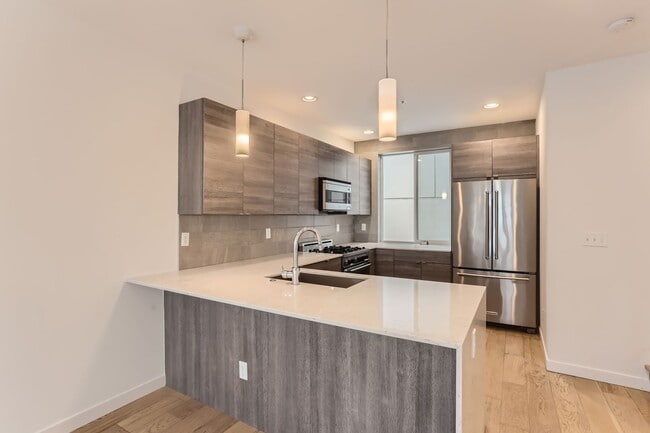 Building Photo - Luxurious 2-Bedroom Townhome with HUGE Multifunctional Space AND loft