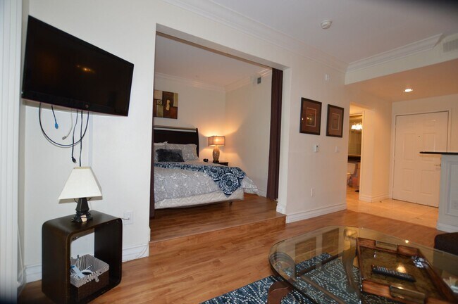 Building Photo - Charming Furnished Studio with Large Patio...