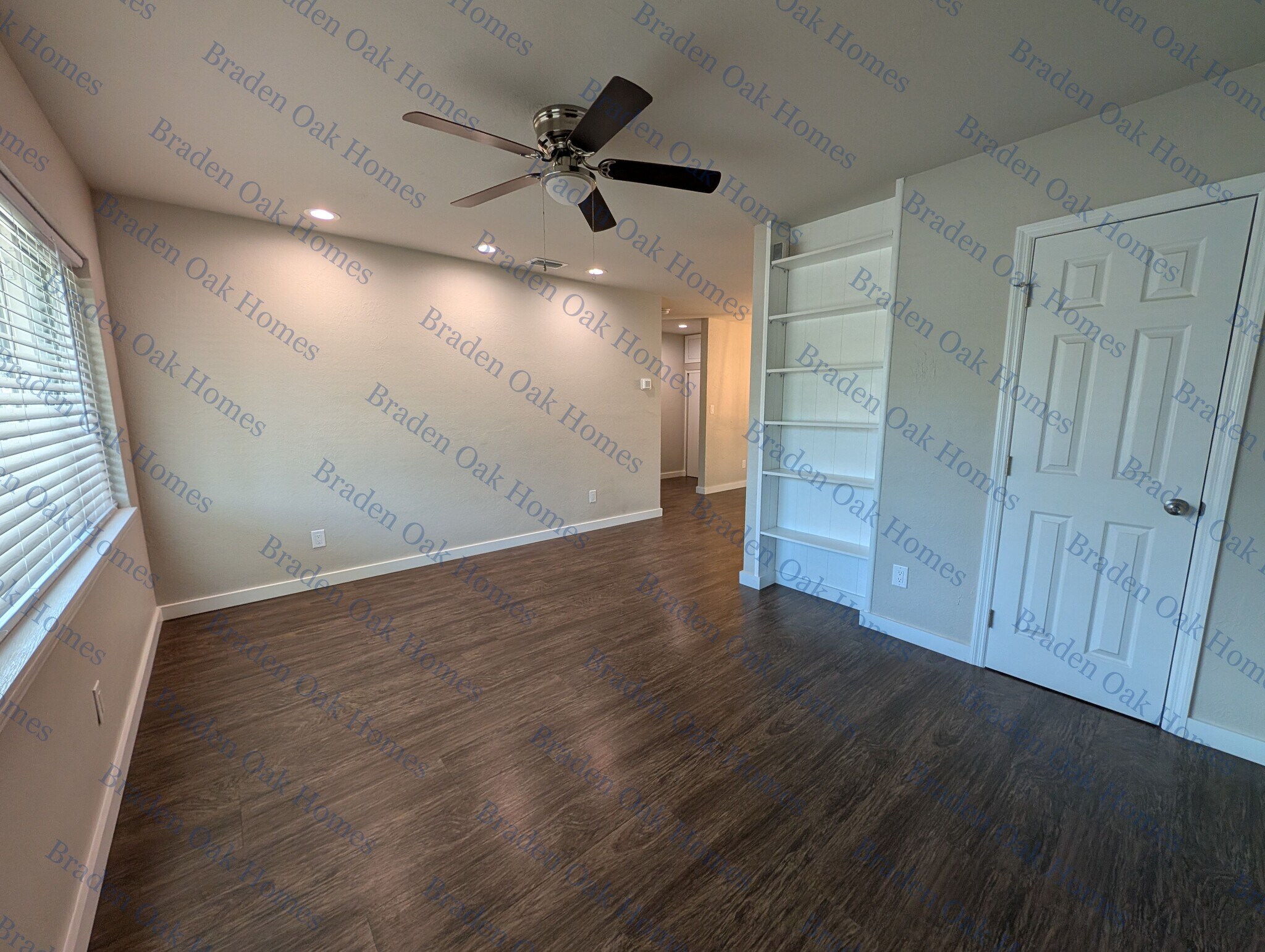 Living room with built-in bookshelf and closet - 1814 26th St W
