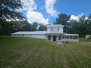Building Photo - Spacious 4-Bedroom Home in Baxter with Large Yard, Hardwood Floors & Outdoor Shed