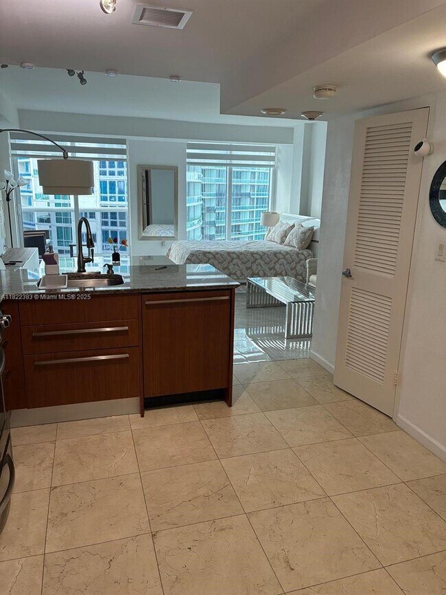 Building Photo - 10275 Collins Ave