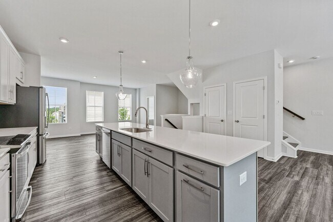 Building Photo - BRAND NEW Townhome located in Westside Ben...