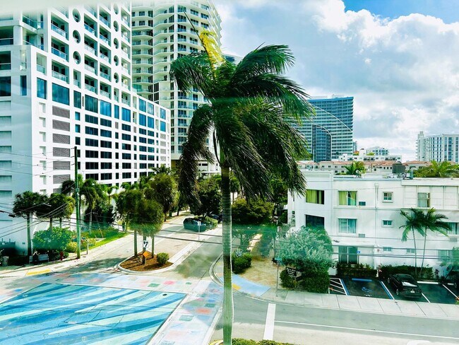 Building Photo - Fully Renovated East-Facing 2BR/2BA + Bonus Room | Ocean Views | In-Unit W/D