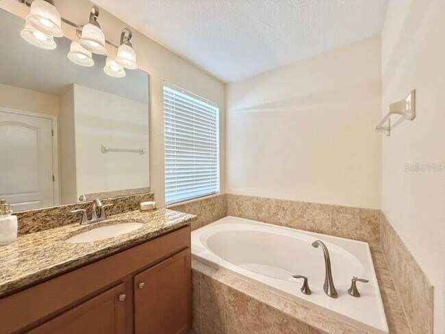 Building Photo - 8894 Candy Palm Rd