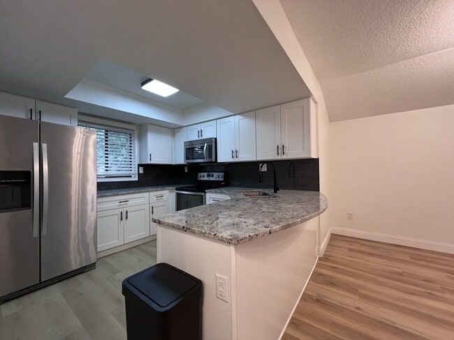 Building Photo - Desirable Sodo District, this spacious 2 b...
