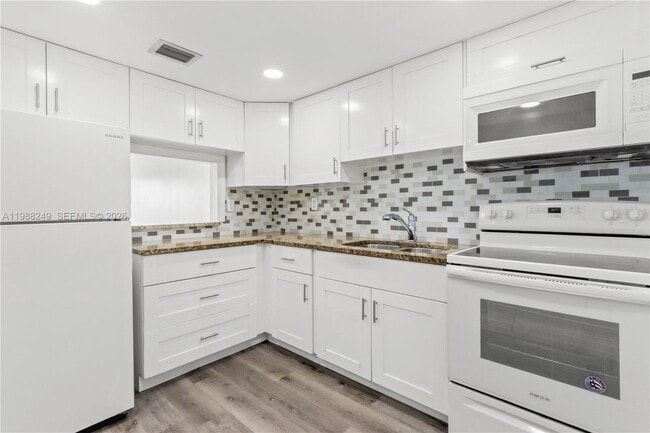 Building Photo - 1855 W 60th St