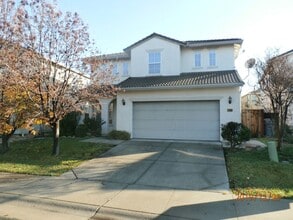 Building Photo - Stunning 4/2.5 Natomas Beauty!  (PLEASE READ ENTIRE AD FOR SHOWING)!