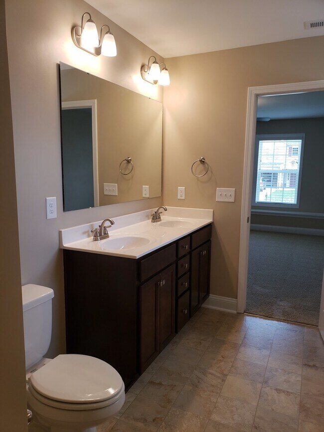 Building Photo - Practically New Home w/Fenced Back Yard Lo...