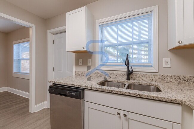 Building Photo - Move in before December 31st and choose your reward: a $250 Amazon Gift Card or a 55" Smart TV!