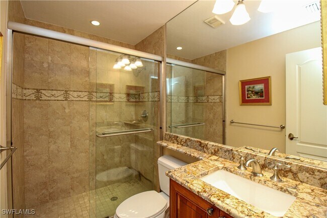 Building Photo - 7024 Pelican Bay Blvd