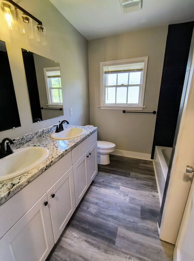 Building Photo - Fully Renovated 3-Bedroom Rental – New Appliances, Huge Yard, Garage, & Individual Room A/C!