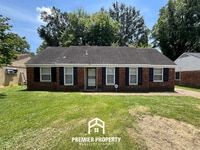 Building Photo - Charming 3BR/2BA Memphis Rental with Brick Fireplace & Private Yard