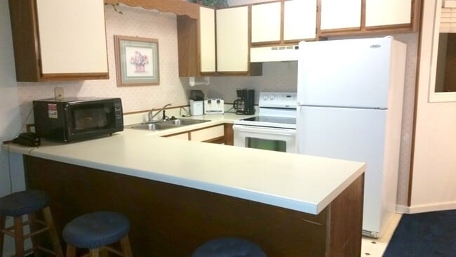 Building Photo - Golf Colony Unit 21F