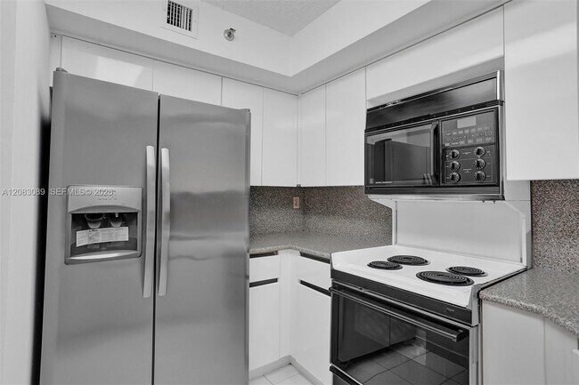 Building Photo - 6767 Collins Ave