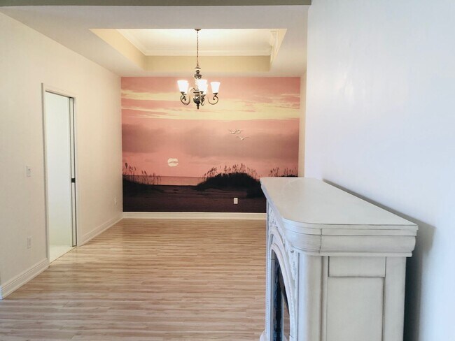 Building Photo - Experience Bell Tower Park. GATED ground floor 2 Bed 2 Bath Den 1 Car Garage Condo.