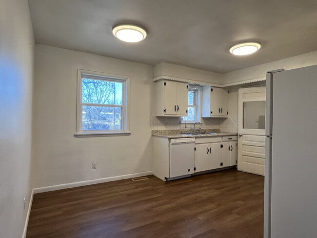 Building Photo - 4-Bedroom Home with Spacious Fenced Yard