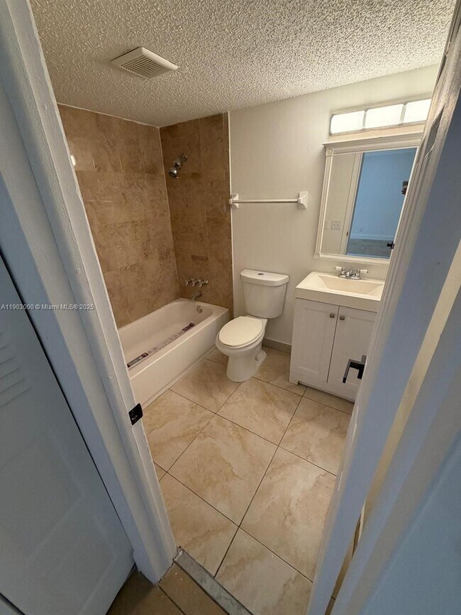 Building Photo - 10701 Royal Palm Blvd