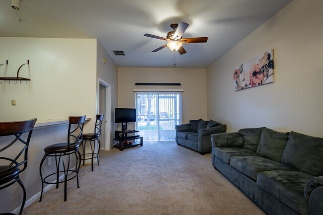 Building Photo - Spacious 2BR/2BA Condo – First Floor, Gate...