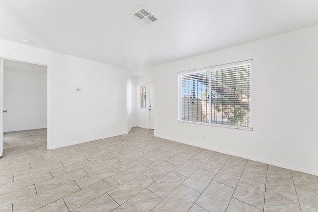 Building Photo - Modern Gated Condo Near the Strip with Pool & Covered Parking!