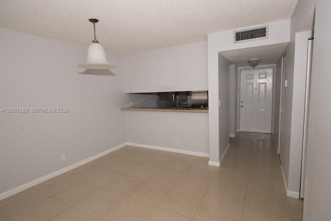 Building Photo - 8550 N Sherman Cir