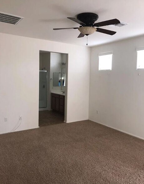 Building Photo - 10450 S Cutting Horse Dr