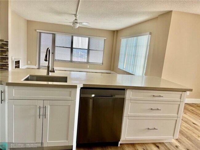 Building Photo - 10777 W Sample Rd