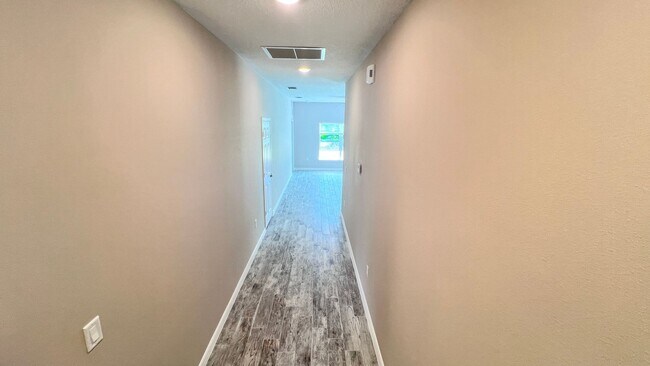 Building Photo - Spacious 3-Bedroom Home with Garage & Pati...