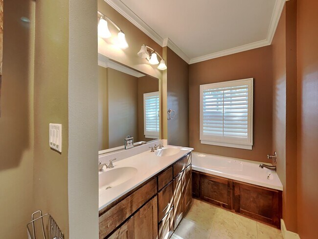 Building Photo - Hospital District Gem: Spacious 2-Story on Corner Lot with Game Room & Outdoor Retreat