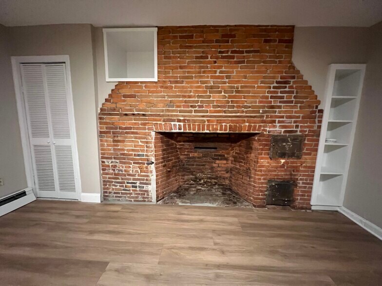 Historic fireplace with bread oven, built in shelves - 347 Elliot St