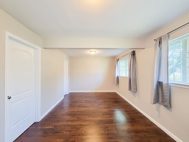 Building Photo - Escape to your updated 3-bed, 2-bath oasis in Goodrich, TX, featuring modern finishes, an open la...