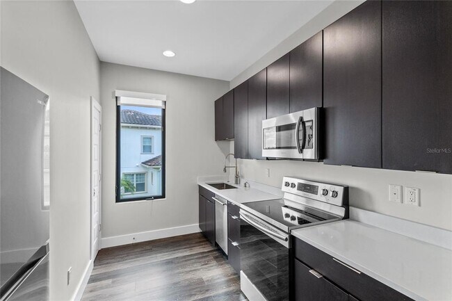 Building Photo - 14105 Corrigan Ave