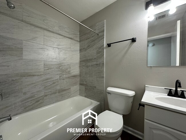 Building Photo - Spacious 4BR/2BA Home in 38141 | Vinyl Flooring & Large Fenced Backyard