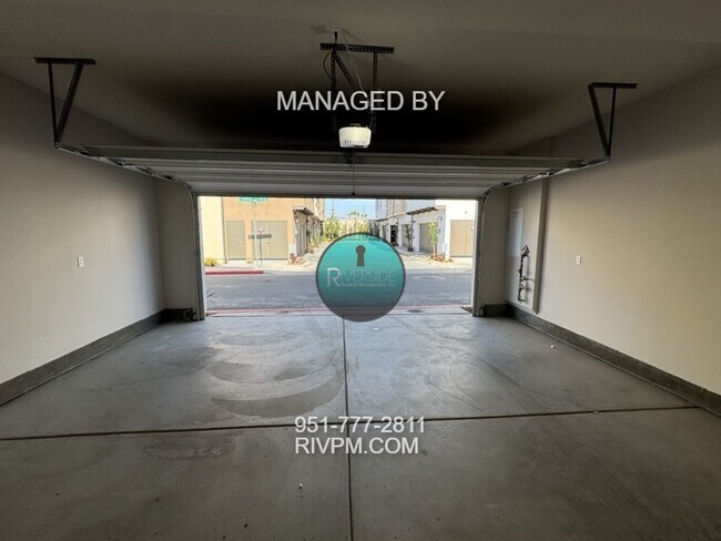 Building Photo - New Build Gem! Modern Three-Bedroom Condo with Bright Open Layout & Private Patio – Available Now!