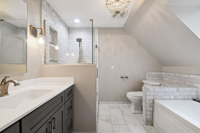 En-suite full bath has been tastefully updated in recent years - 1541 Hollybrook Rd