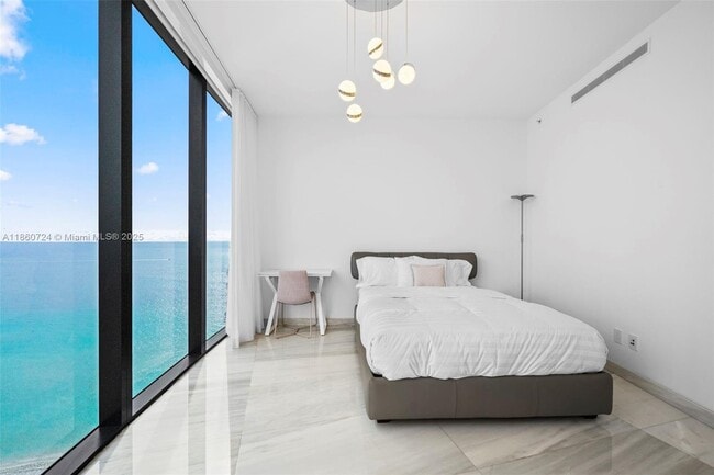 Building Photo - 18555 Collins Ave