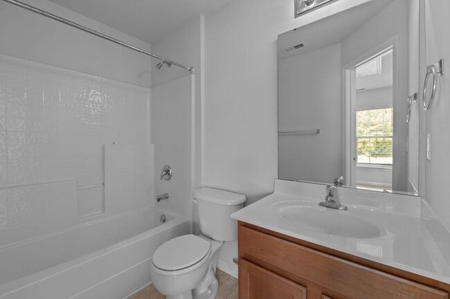 Building Photo - Spacious 3-Story End-Unit Townhome Near RTP