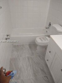 Building Photo - 7006-7008 NW 78th Ave