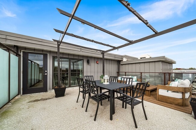 Building Photo - Stylish 2BR/2BA Bi-Level Condo with Private Roof Deck and Covered Parking!