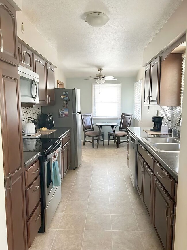 Building Photo - Charming & Updated 3-Bedroom Home with Sunroom, Fireplace & Garage