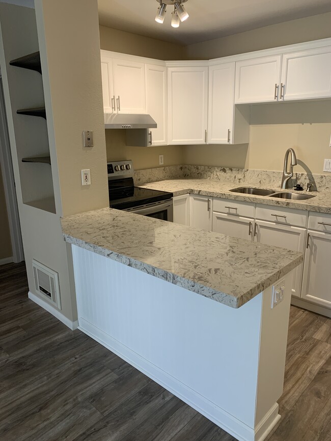 Kitchen with bar - 6394 Rancho Mission Rd. Unit 111