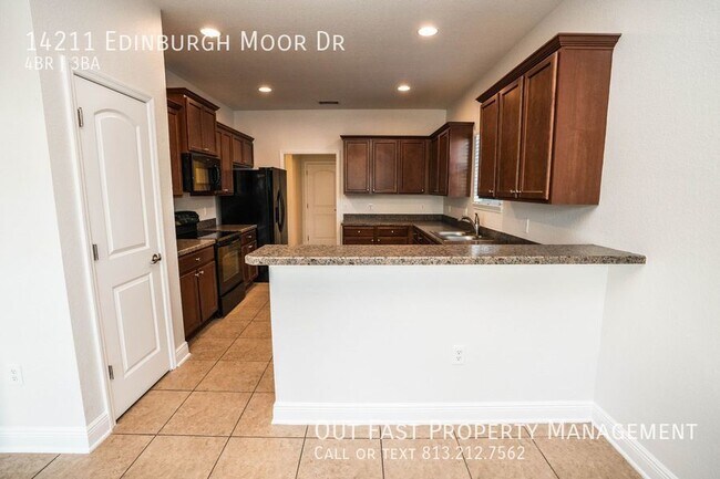 Building Photo - Spacious and Modern 4-Bedroom Home with a ...