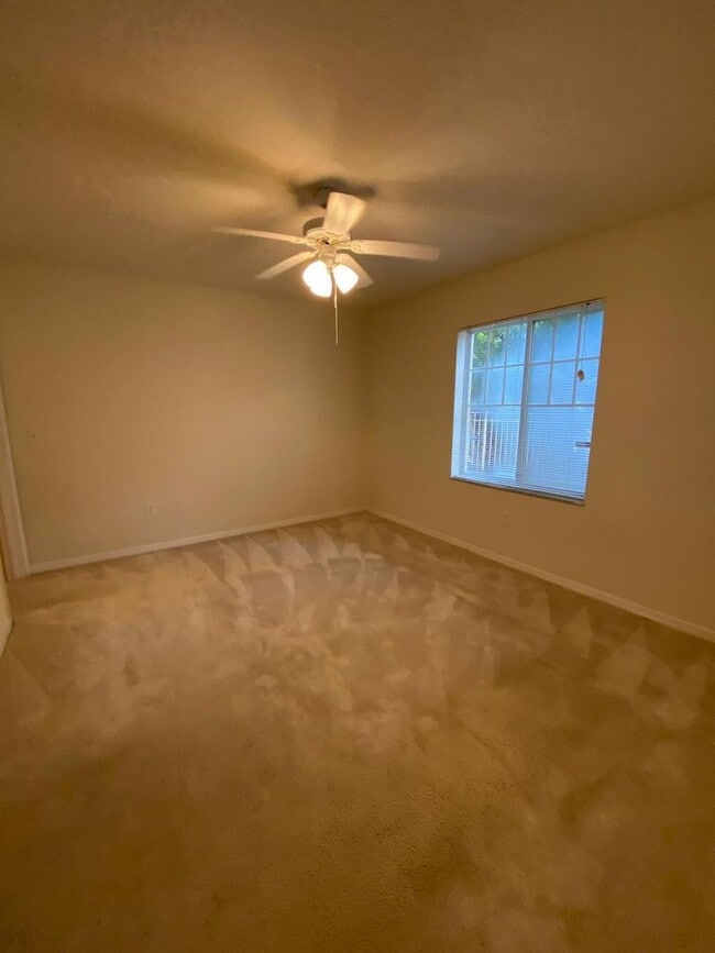 Building Photo - Spacious 2BR/2BA First-Floor Condo with Garage