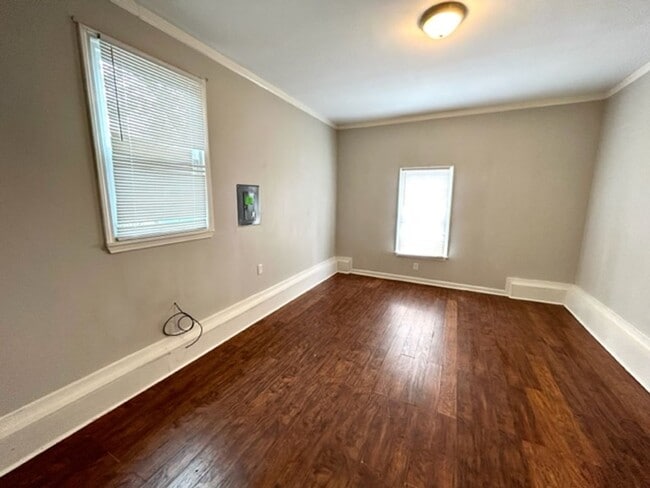 Building Photo - THREE BEDROOM ONE AND HALF BATH BRICK RANCH HOME