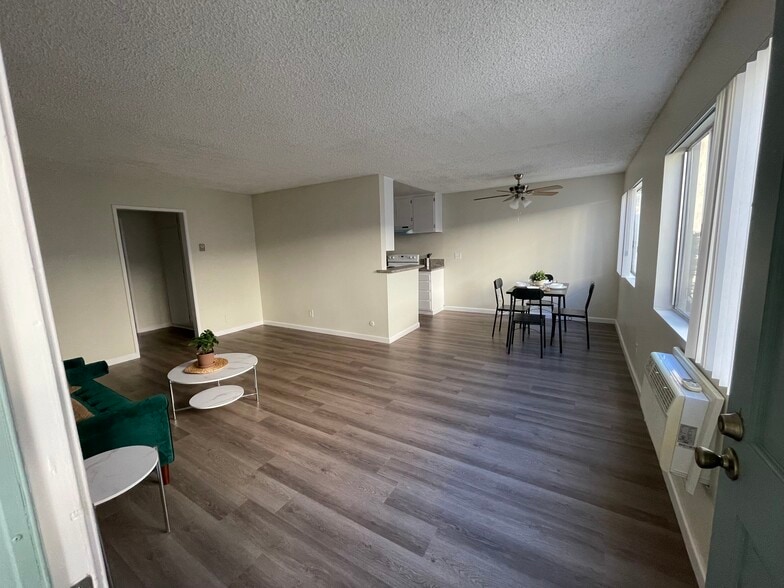 2 bed + 2 bath - entry - living room - Woodridge Apartments