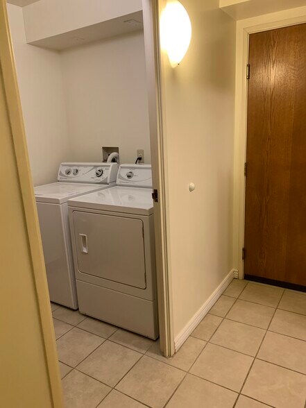 View of front door and laundry room - 7420 E Quincy Ave