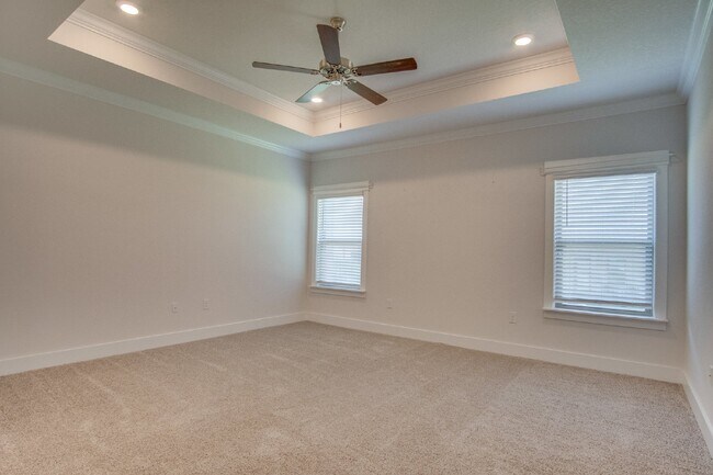 Building Photo - Spacious Cantonment Townhome with Open Layout, 2-Car Garage, Covered Back Porch & Easy Access to ...