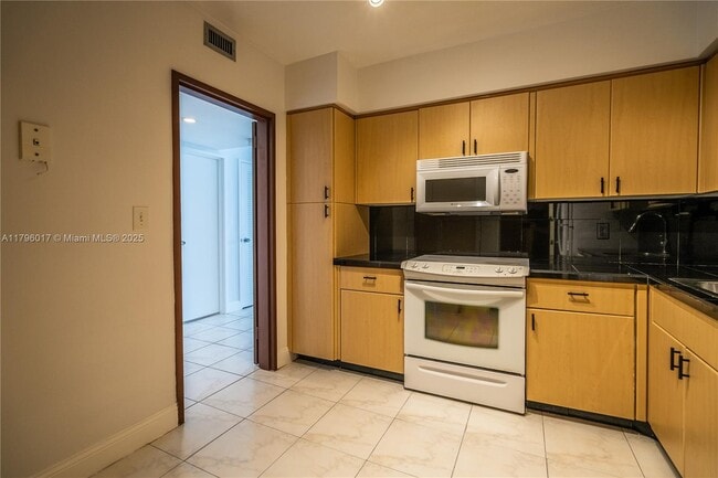 Building Photo - 5700 Collins Ave