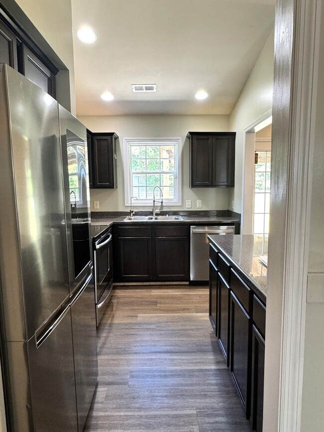 Building Photo - Comfort, Charm & Room for Everything You Love!
