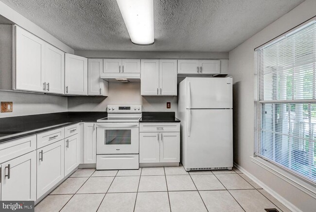 Building Photo - 8125 Greenspring Vly Rd
